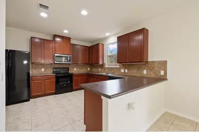 10909 Helms Deep Drive, Austin, TX 78754 - Photo 9