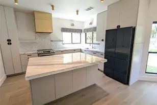 9257 Scenic Bluff Dr, Austin, TX 78733 - Photo 13