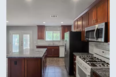 9511 Woodvale Drive, Austin, TX 78729 - Photo 9