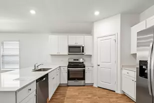 12101 Pike Bnd, Mustang Ridge, TX 78610 - Photo 11