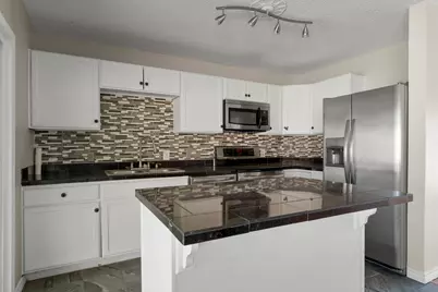 4706 Brassiewood Drive, Austin, TX 78744 - Photo 9