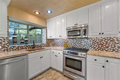 11021 Whiskey River Drive, Austin, TX 78748 - Photo 13