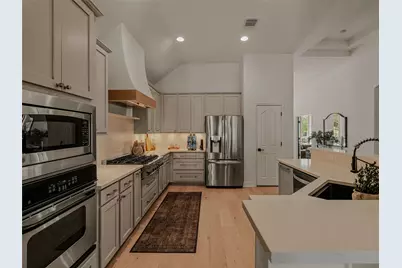 12516 Uvalde Creek Drive, Austin, TX 78732 - Photo 11