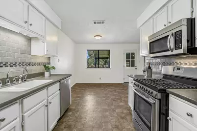 10104 Woodland Village Drive, Austin, TX 78750 - Photo 9