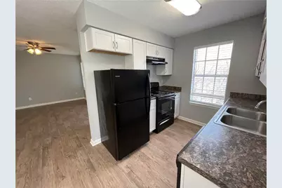 7417 Vintage Hills Drive #D, Austin, TX 78723 - Photo 11