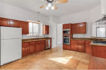 12606 Hunters Chase Drive, Austin, TX 78729 - Photo 7