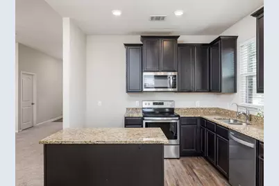 13712 Charles W Fairbanks Cove, Manor, TX 78653 - Photo 11