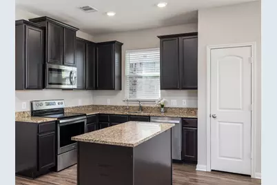 13712 Charles W Fairbanks Cove, Manor, TX 78653 - Photo 9