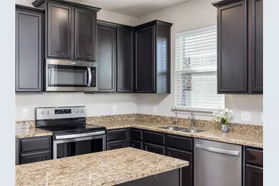 13712 Charles W Fairbanks Cove, Manor, TX 78653 - Photo 7
