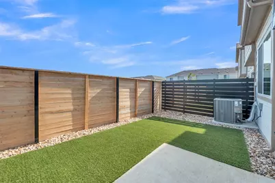 9317 Curious Squirrel Street, Austin, TX 78744 - Photo 7