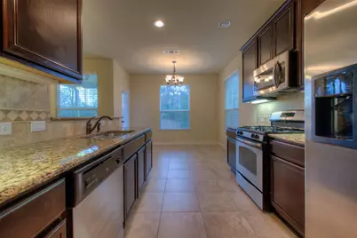 8608 White Ibis Drive, Austin, TX 78729 - Photo 9