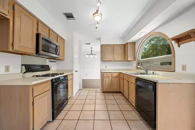 12810 NW Blackfoot Trail, Austin, TX 78729 - Photo 11