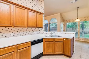 7715 Elkhorn Mountain Trail, Austin, TX 78729 - Photo 9