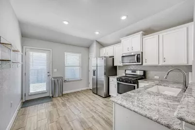 8303 Cottage Rose Drive, Austin, TX 78744 - Photo 7