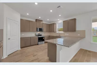 18005 Bridled Stallion Drive, Manor, TX 78653 - Photo 13