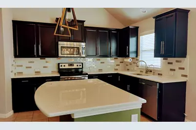 1000 Farm House Cove, Hutto, TX 78634 - Photo 5