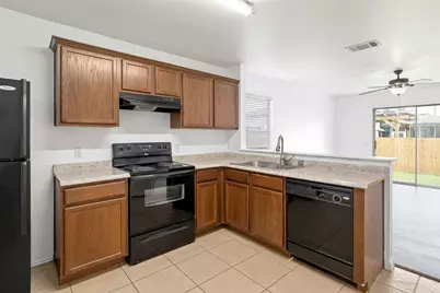 12409 Sky Harbor Drive, Del Valle, TX 78617 - Photo 7