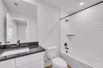 9312 Curious Squirrel Street, Austin, TX 78744 - Photo 21