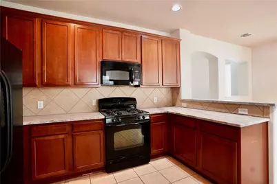 8712 Wood Stork Drive, Austin, TX 78729 - Photo 11