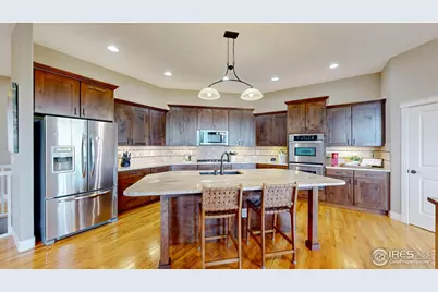 7258 Spanish Bay Dr, Windsor, CO 80550 - Photo 11