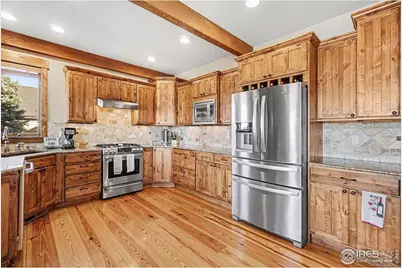 39111 Hilltop Cir, Severance, CO 80610 - Photo 11