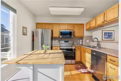 805 Summer Hawk Dr #J-58, Longmont, CO 80504 - Photo 9