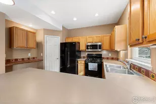 2237 Watersong Cir, Longmont, CO 80504 - Photo 21