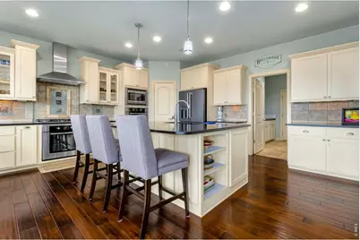 6053 Woodcliffe Dr, Windsor, CO 80550 - Photo 7