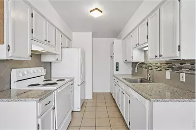 3121 S Tamarac Dr #H-208, Denver, CO 80231 - Photo 11