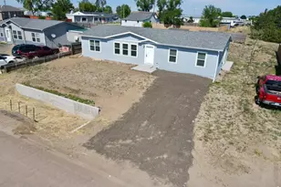 114 High St, Wiggins, CO 80654 - Photo 1