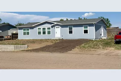 114 High St, Wiggins, CO 80654 - Photo 1