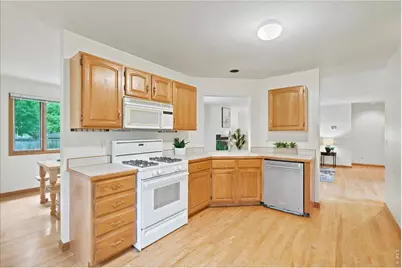 1003 Medicine Man Ct, Windsor, CO 80550 - Photo 7