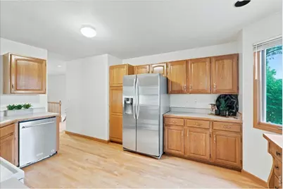 1003 Medicine Man Ct, Windsor, CO 80550 - Photo 9