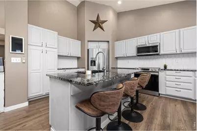1191 Ridge West Dr, Windsor, CO 80550 - Photo 11