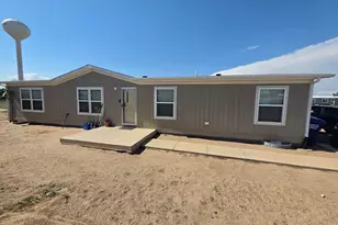 209 Larch Dr, Log Lane Village, CO 80705 - Photo 1