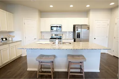 6673 N Ceylon St, Denver, CO 80249 - Photo 7