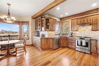 39111 Hilltop Cir, Severance, CO 80610 - Photo 7