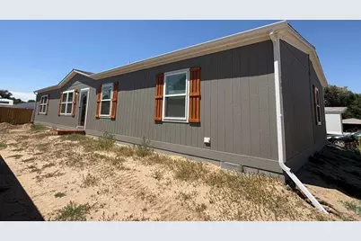 103 Beach Dr, Log Lane Village, CO 80705 - Photo 1