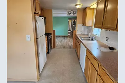 227 Balsam St, Log Lane Village, CO 80705 - Photo 11