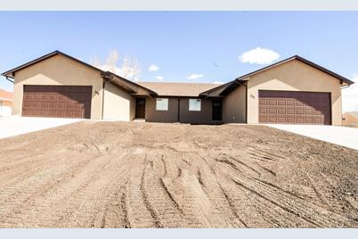 239 241 W Laurue Ln, Pueblo West, CO 81007 - Photo 1