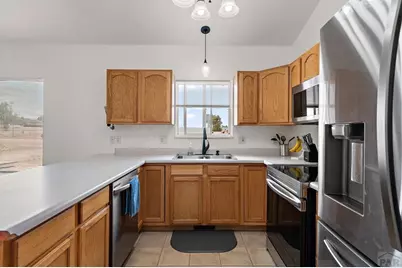 1467 W Plaza De Los Leones Dr, Pueblo West, CO 81007 - Photo 15