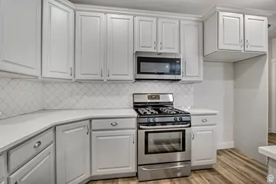 7116 W Adamo Dr S, West Valley, UT 84128 - Photo 7