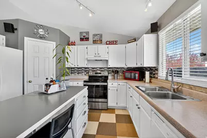 3291 S Hunter Farm Way, West Valley, UT 84128 - Photo 11