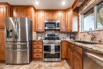 4016 S Stillwater Way, West Valley, UT 84120 - Photo 11