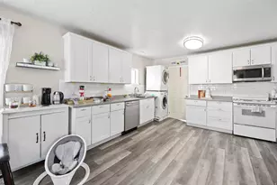 7609 N Mountain View Rd, Lake Point, UT 84074 - Photo 9