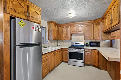 1675 W Warnock Ave, West Valley, UT 84119 - Photo 7