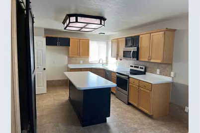 153 E Country Club Dr N, Stansbury Park, UT 84074 - Photo 3