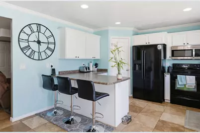 2437 N Charleston Ave W, Harrisville, UT 84414 - Photo 7