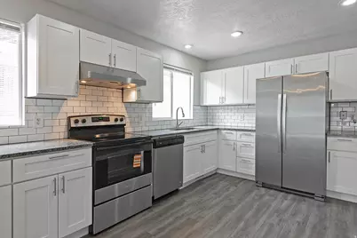 5991 S Origin Pl, Taylorsville, UT 84123 - Photo 9
