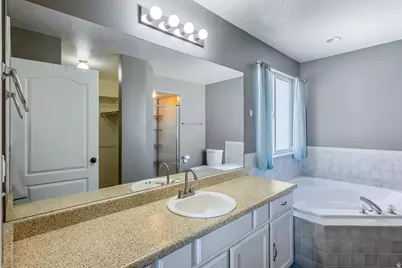107 N Crystal Bay Dr W, Stansbury Park, UT 84074 - Photo 13